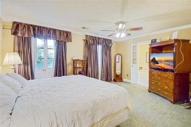 Indulge in comfort in this 4-bedroom, 2 bath, and two  1/2  bath on Timberlane Country Club in Louisiana - for sale on GolfHomes.com, golf home, golf lot