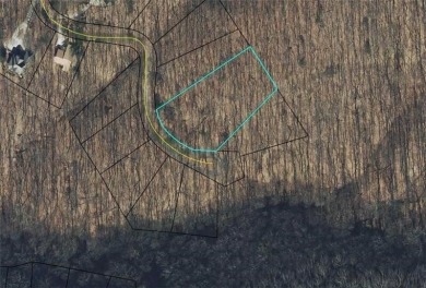 This 1.21 acre lot is located on a cul-de-sac across the road on Bent Tree Golf Course in Georgia - for sale on GolfHomes.com, golf home, golf lot