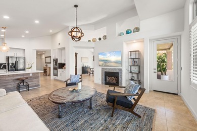 Step into this upgraded Islands 3 model that has been remodeled on Oasis Country Club in California - for sale on GolfHomes.com, golf home, golf lot