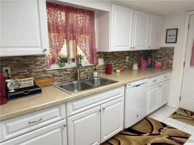 Welcome to this beautifully maintained home nestled in the on Stonecrest Golf and Club Club in Florida - for sale on GolfHomes.com, golf home, golf lot