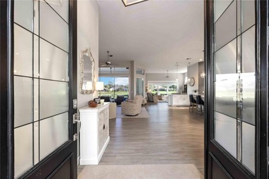 Discover this stunning, fully remodeled golf residence in the on The Venice Golf and Country Club in Florida - for sale on GolfHomes.com, golf home, golf lot