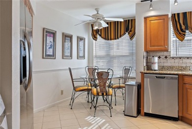 Relaxing is easy from this ideally located golf course condo in on Isla Del Sol Yacht and Country Club in Florida - for sale on GolfHomes.com, golf home, golf lot