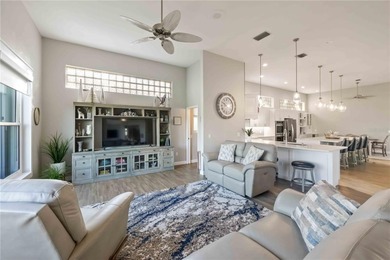 Discover this stunning, fully remodeled golf residence in the on The Venice Golf and Country Club in Florida - for sale on GolfHomes.com, golf home, golf lot