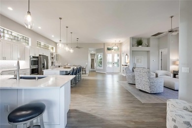 Discover this stunning, fully remodeled golf residence in the on The Venice Golf and Country Club in Florida - for sale on GolfHomes.com, golf home, golf lot
