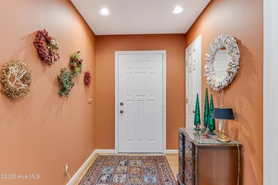 Beautiful brick home tucked away on a quiet cul-de-sac with on Sea Trail Golf Resort in North Carolina - for sale on GolfHomes.com, golf home, golf lot