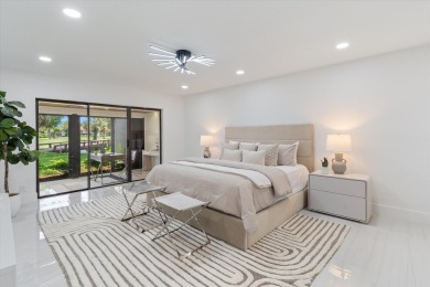 Recently updated and remodeled villa on the lake in Boca Lagoe on Boca Lago Golf and Country Club in Florida - for sale on GolfHomes.com, golf home, golf lot