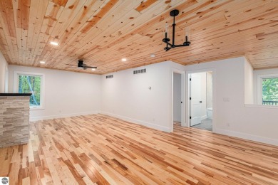 Modern New Construction in the Heart of Leelanau County. Nestled on Manitou Passage Golf Club in Michigan - for sale on GolfHomes.com, golf home, golf lot
