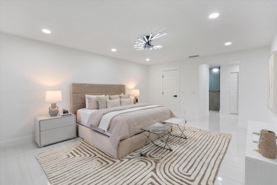 Recently updated and remodeled villa on the lake in Boca Lagoe on Boca Lago Golf and Country Club in Florida - for sale on GolfHomes.com, golf home, golf lot