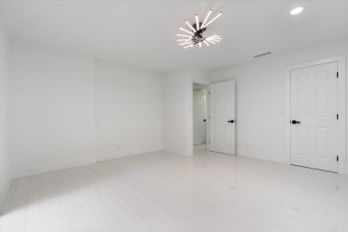 Recently updated and remodeled villa on the lake in Boca Lagoe on Boca Lago Golf and Country Club in Florida - for sale on GolfHomes.com, golf home, golf lot