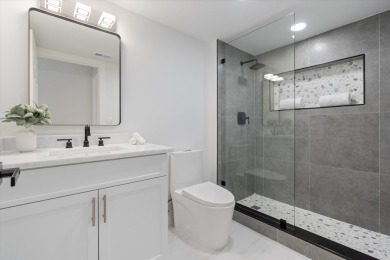 Recently updated and remodeled villa on the lake in Boca Lagoe on Boca Lago Golf and Country Club in Florida - for sale on GolfHomes.com, golf home, golf lot