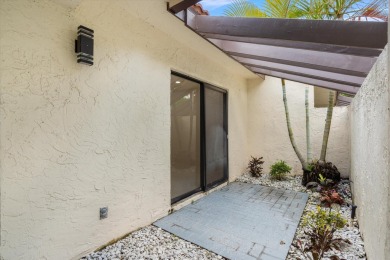 Recently updated and remodeled villa on the lake in Boca Lagoe on Boca Lago Golf and Country Club in Florida - for sale on GolfHomes.com, golf home, golf lot