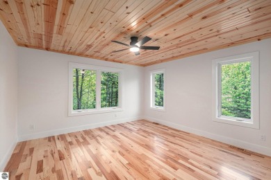 Modern New Construction in the Heart of Leelanau County. Nestled on Manitou Passage Golf Club in Michigan - for sale on GolfHomes.com, golf home, golf lot