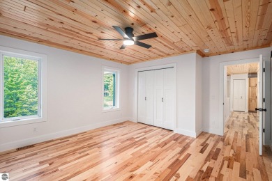 Modern New Construction in the Heart of Leelanau County. Nestled on Manitou Passage Golf Club in Michigan - for sale on GolfHomes.com, golf home, golf lot