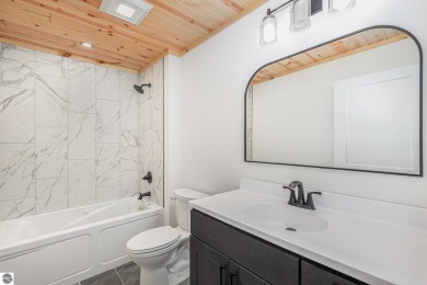 Modern New Construction in the Heart of Leelanau County. Nestled on Manitou Passage Golf Club in Michigan - for sale on GolfHomes.com, golf home, golf lot