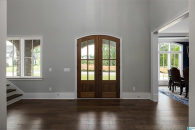 Custom-built luxury on the 16th hole of the Ross Bridge golf on Ross Bridge Golf Resort in Alabama - for sale on GolfHomes.com, golf home, golf lot