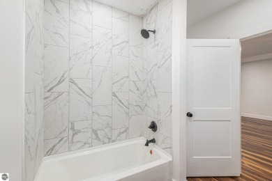Modern New Construction in the Heart of Leelanau County. Nestled on Manitou Passage Golf Club in Michigan - for sale on GolfHomes.com, golf home, golf lot