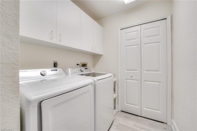 Welcome to a beautifully UPDATED THREE BEDROOM end unit condo on Estero Country Club in Florida - for sale on GolfHomes.com, golf home, golf lot