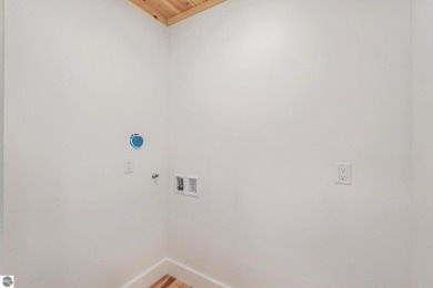 Modern New Construction in the Heart of Leelanau County. Nestled on Manitou Passage Golf Club in Michigan - for sale on GolfHomes.com, golf home, golf lot