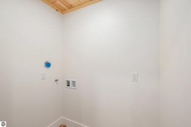 Modern New Construction in the Heart of Leelanau County. Nestled on Manitou Passage Golf Club in Michigan - for sale on GolfHomes.com, golf home, golf lot