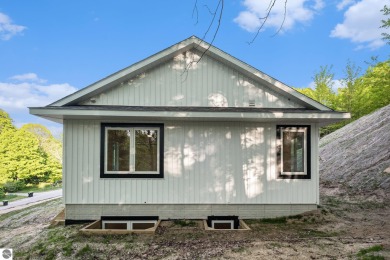 Modern New Construction in the Heart of Leelanau County. Nestled on Manitou Passage Golf Club in Michigan - for sale on GolfHomes.com, golf home, golf lot