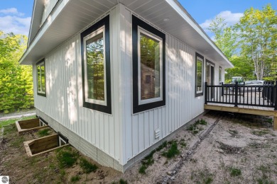 Modern New Construction in the Heart of Leelanau County. Nestled on Manitou Passage Golf Club in Michigan - for sale on GolfHomes.com, golf home, golf lot