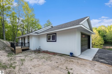 Modern New Construction in the Heart of Leelanau County. Nestled on Manitou Passage Golf Club in Michigan - for sale on GolfHomes.com, golf home, golf lot