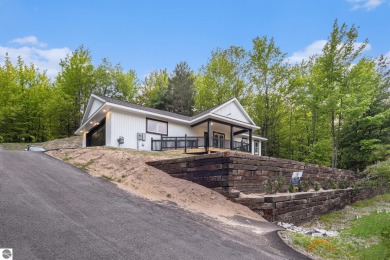 Modern New Construction in the Heart of Leelanau County. Nestled on Manitou Passage Golf Club in Michigan - for sale on GolfHomes.com, golf home, golf lot