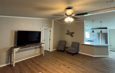 This is a newly remodeled mobile home in Horseshoe Bend Air Park on Horseshoe Bend Country Club in Texas - for sale on GolfHomes.com, golf home, golf lot