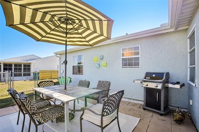 AFFORDABLE & ADORABLE! This charming, TURN-KEY FURNISHED on Duffys Golf Center in Florida - for sale on GolfHomes.com, golf home, golf lot