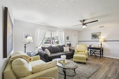 AFFORDABLE & ADORABLE! This charming, TURN-KEY FURNISHED on Duffys Golf Center in Florida - for sale on GolfHomes.com, golf home, golf lot