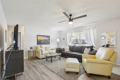 AFFORDABLE & ADORABLE! This charming, TURN-KEY FURNISHED on Duffys Golf Center in Florida - for sale on GolfHomes.com, golf home, golf lot