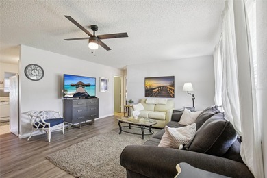 AFFORDABLE & ADORABLE! This charming, TURN-KEY FURNISHED on Duffys Golf Center in Florida - for sale on GolfHomes.com, golf home, golf lot