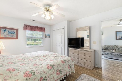 This spacious and well-maintained first-floor end unit features on River Oaks Golf Plantation  in South Carolina - for sale on GolfHomes.com, golf home, golf lot