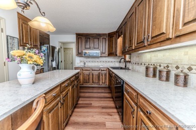 Welcome to 259 Golf Drive - a beautiful brick home perfectly on Carolina Lakes Country Club in North Carolina - for sale on GolfHomes.com, golf home, golf lot