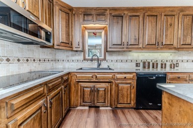 Welcome to 259 Golf Drive - a beautiful brick home perfectly on Carolina Lakes Country Club in North Carolina - for sale on GolfHomes.com, golf home, golf lot