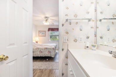This spacious and well-maintained first-floor end unit features on River Oaks Golf Plantation  in South Carolina - for sale on GolfHomes.com, golf home, golf lot