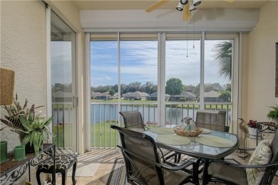 Pristine END UNIT overlooking a tranquil pond with clusters of on Villages of Country Creek Golf Course in Florida - for sale on GolfHomes.com, golf home, golf lot