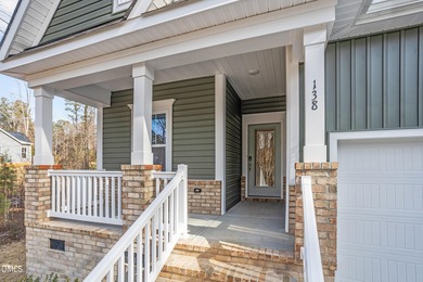 Welcome to 138 Sacred Fire Rd in the Lake Royale community of on River Golf and Country Club at Lake Royale in North Carolina - for sale on GolfHomes.com, golf home, golf lot