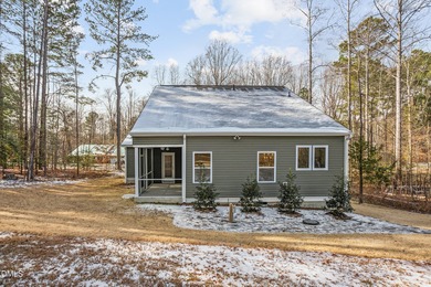 Welcome to 138 Sacred Fire Rd in the Lake Royale community of on River Golf and Country Club at Lake Royale in North Carolina - for sale on GolfHomes.com, golf home, golf lot