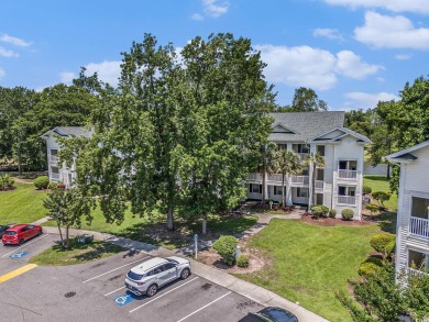 This spacious and well-maintained first-floor end unit features on River Oaks Golf Plantation  in South Carolina - for sale on GolfHomes.com, golf home, golf lot