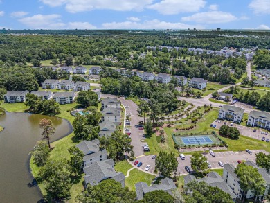 This spacious and well-maintained first-floor end unit features on River Oaks Golf Plantation  in South Carolina - for sale on GolfHomes.com, golf home, golf lot