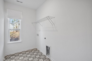 Welcome to 138 Sacred Fire Rd in the Lake Royale community of on River Golf and Country Club at Lake Royale in North Carolina - for sale on GolfHomes.com, golf home, golf lot