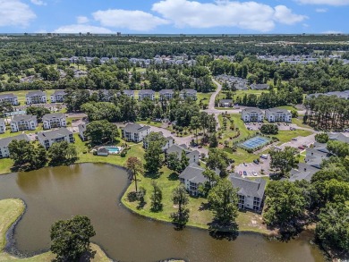 This spacious and well-maintained first-floor end unit features on River Oaks Golf Plantation  in South Carolina - for sale on GolfHomes.com, golf home, golf lot