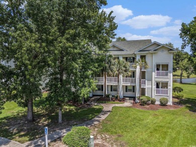 This spacious and well-maintained first-floor end unit features on River Oaks Golf Plantation  in South Carolina - for sale on GolfHomes.com, golf home, golf lot