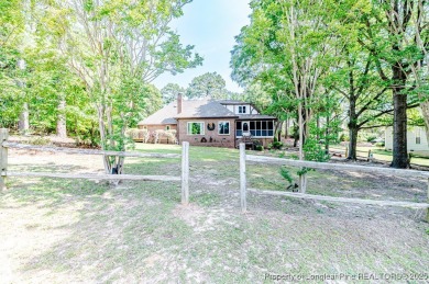 Welcome to 259 Golf Drive - a beautiful brick home perfectly on Carolina Lakes Country Club in North Carolina - for sale on GolfHomes.com, golf home, golf lot