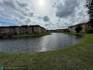 2781 N Pine Island Rd 202 on Sunrise Lakes Phase III in Florida - for sale on GolfHomes.com, golf home, golf lot