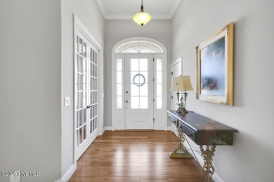 A stunning house built by Kent Homes with too many upgrades to on Cape Fear National At Brunswick Forest in North Carolina - for sale on GolfHomes.com, golf home, golf lot