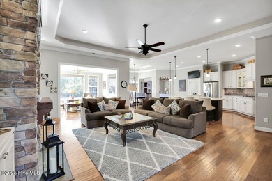 A stunning house built by Kent Homes with too many upgrades to on Cape Fear National At Brunswick Forest in North Carolina - for sale on GolfHomes.com, golf home, golf lot