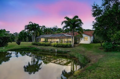 Welcome to your private South Florida retreat in the highly on  in Florida - for sale on GolfHomes.com, golf home, golf lot