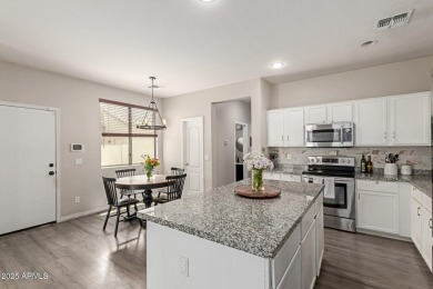 Beautiful and spacious 4-bedroom, 2.5-bath home located in the on Aguila Golf Course - Aguila in Arizona - for sale on GolfHomes.com, golf home, golf lot